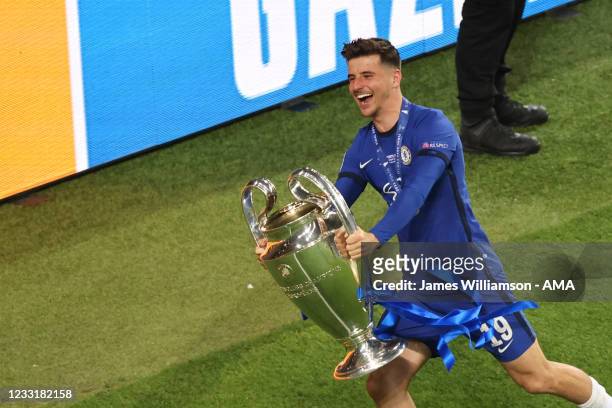 Mason Mount of Chelsea celebrates with the UEFA Champions League trophy during the Sky Bet League One Play-off Final match between Blackpool and...