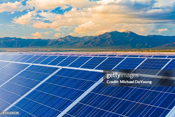 mountains behind solar panels - new mexico mountains stock pictures, royalty-free photos & images