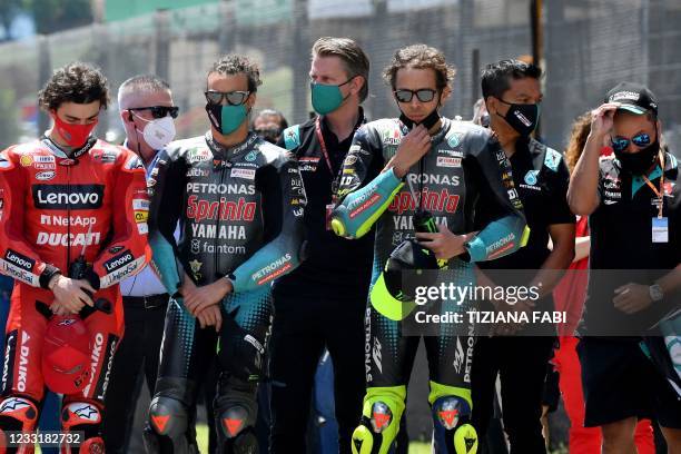 Riders observe a minute of silence in tribute to Swiss Moto3 rider Jason Dupasquier who died aged 19 from injuries sustained in a crash in qualifying...