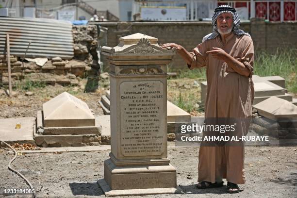 Picture shows Ali Mansour, the care taker of the cemetery of the Protestant Christians in Baghdad, where British archaeologist, writer, diplomat and...