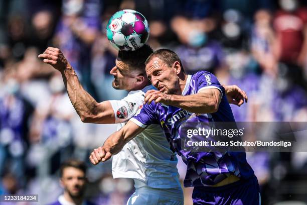 Stefan Kutschke of Ingolstadt and Ulrich Taffertshofer of Osnabrück in action during the 2. Bundesliga playoff leg two match between VfL Osnabrück...