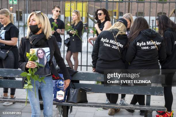 Relatives and local residents hold a silent march in tribute of 27-year-old Ayla Mintjes, who died after being shot at in the Maassluisstraat in...