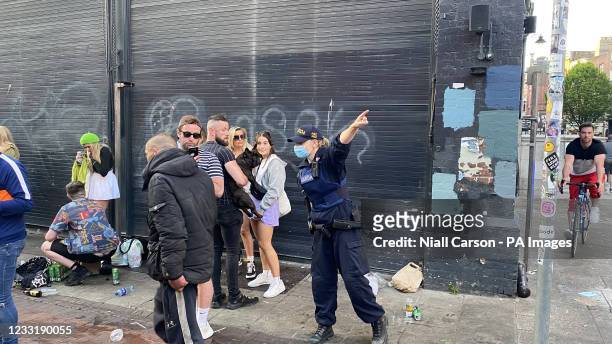 Members of Gardai enforce coronavirus restrictons and move people on from South William street, Dublin. The chief medical officer, Dr Tony Holohan,...