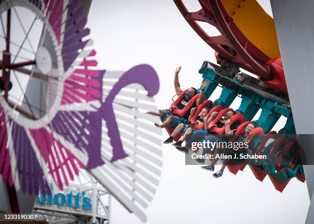 Buena Park, CA Park-goers ride the HangTime roller coaster during the re-opening day at Knott's Berry Farm to the full public and celebrate the 100th...