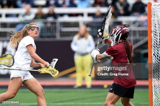 Rachel Hall of the Boston College Eagles makes a save in the first half against Sierra Cockerille of the Syracuse Orange during the Division I...