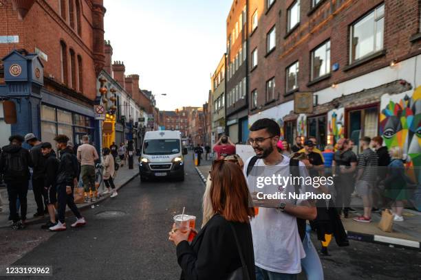 Members of Gardai enforce coronavirus restrictions and move people from Drury Street in Dublin. The chief medical officer, Dr. Tony Holohan...