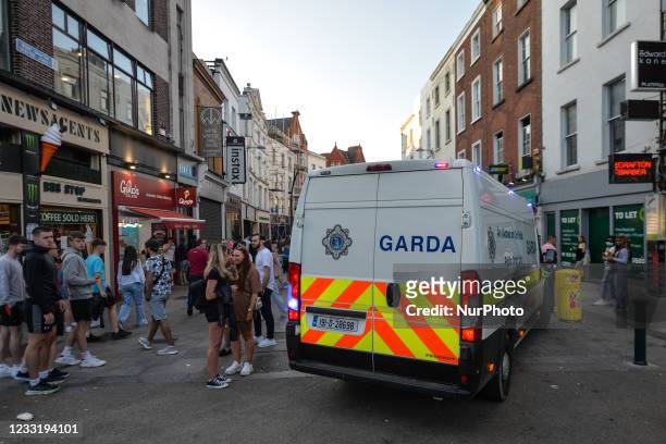 Members of Gardai enforce coronavirus restrictions and move people from Grafton Street in Dublin. The chief medical officer, Dr. Tony Holohan...