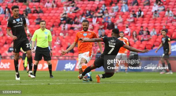 Blackpool's Kevin Stewart and Lincoln City's Tayo Edun during the Sky Bet League One Play-off Final match between Blackpool and Lincoln City at...