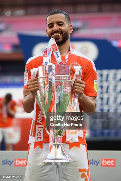 Kevin Stewart of Blackpool holing the trophy during the Sky Bet League 1 match between Blackpool and Lincoln City at Wembley Stadium, London on...