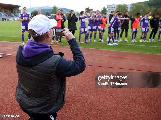 Head coach Peter Stoeger of FK Austria Wien take photos during the tipico Bundesliga match between Wolfsberger AC and FK Austria Wien at...