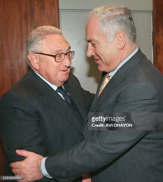 Former US Secretary of State Henry Kissinger is greeted by Israeli Prime Minister Benjamin Netanyahu10 January in Jerusalem. Kissinger arrived in...