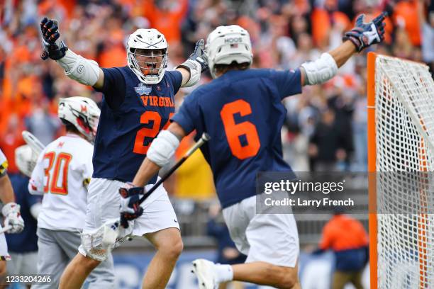 Virginia Cavaliers attack Payton Cormier and mid Dox Aitken celebrate a goal against the Maryland Terrapins during the Division I Men's Lacrosse...