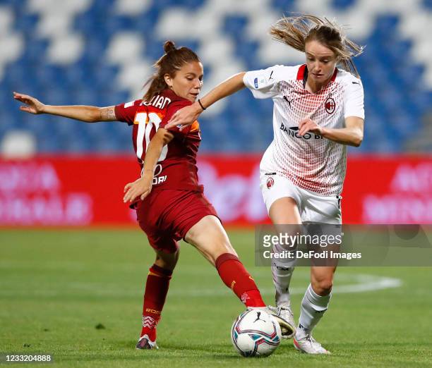 Manuela Giugliano of AS Roma and Christy Grimshaw of AC Milan battle for the ball during the Women's Coppa Italia Final match between AS Roma and AC...