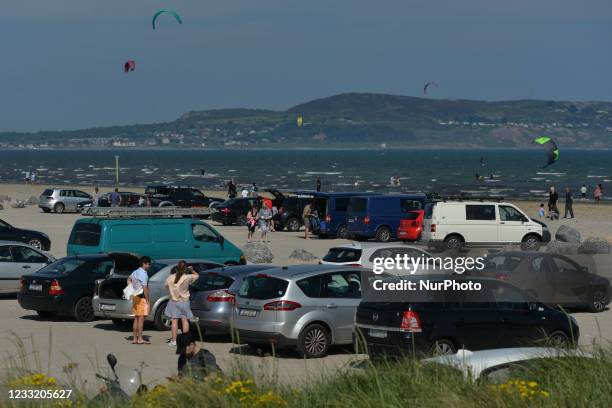 Busy Dollymount Strand during nice sunny weather at North Bull Island, in Dublin. On Monday, May 31 in Dublin, Ireland.
