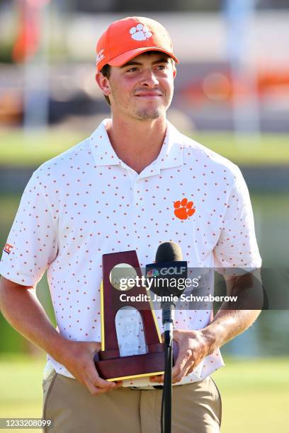 Turk Pettit of the Clemson Tigers celebrates after winning the individual title during the Division I Mens Golf Championship held at the Grayhawk...