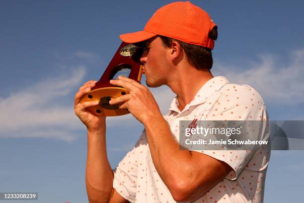 Turk Pettit of the Clemson Tigers celebrates after winning the individual title during the Division I Mens Golf Championship held at the Grayhawk...