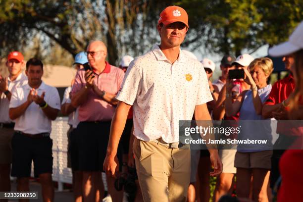 Turk Pettit of the Clemson Tigers celebrates after winning the individual title during the Division I Mens Golf Championship held at the Grayhawk...