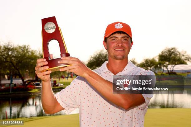 Turk Pettit of the Clemson Tigers celebrates after winning the individual title during the Division I Mens Golf Championship held at the Grayhawk...