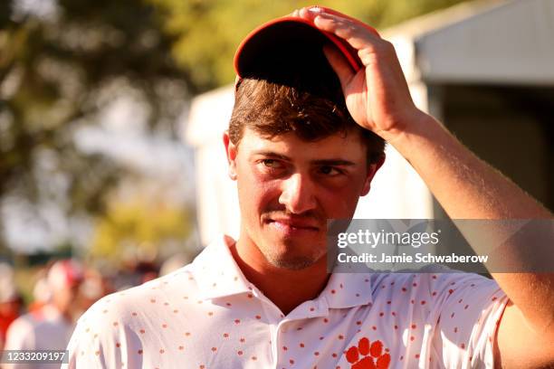 Turk Pettit of the Clemson Tigers celebrates after winning the individual title during the Division I Mens Golf Championship held at the Grayhawk...