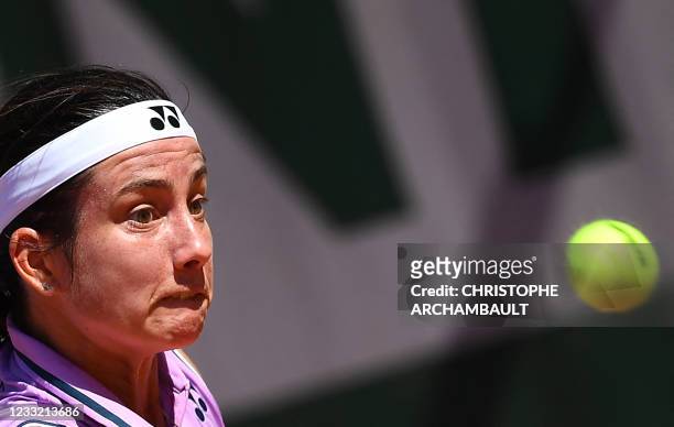 Latvia's Anastasija Sevastova eyes the ball as she returns the ball to Jennifer Brady of the US during their women's singles first round tennis match...