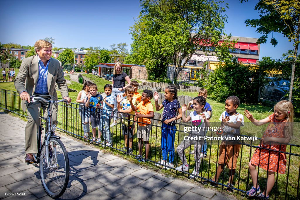 King Willem-Alexander Of The Netherlands Visits His Neighbourhood By Bicycle