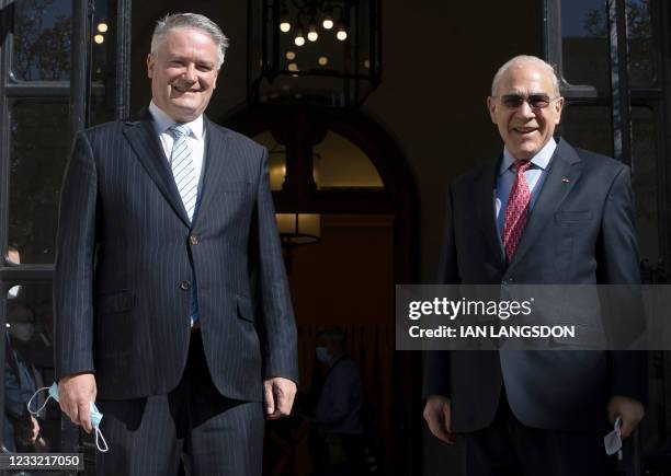 Organisation for Economic Co-operation and Development Secretary-General Angel Gurria poses with Former Australian Finance Minister Mathias Cormann...