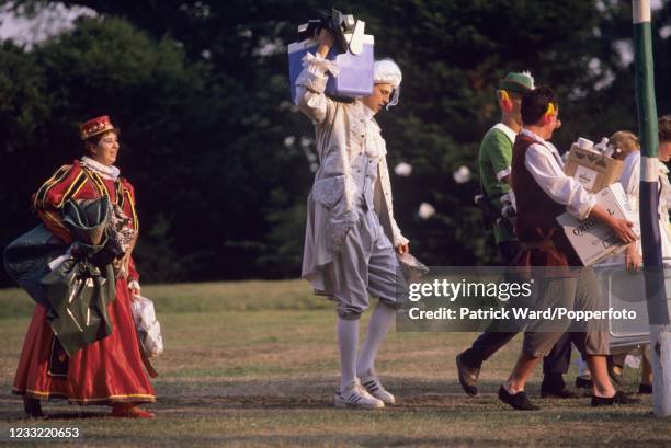 Guests wearing fancy dress arriving at a Fete Champetre, a garden party featuring food, drink and entertainment, popular in the 18th century, at...