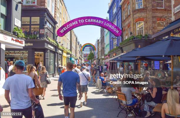 View of a busy Carnaby Street in Central London as the heatwave continues in England.