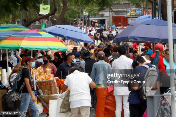 Persons take to the streets to enjoy parks and tourist areas, after the Government of Mexico allowed the resumption of outdoor activities after it...