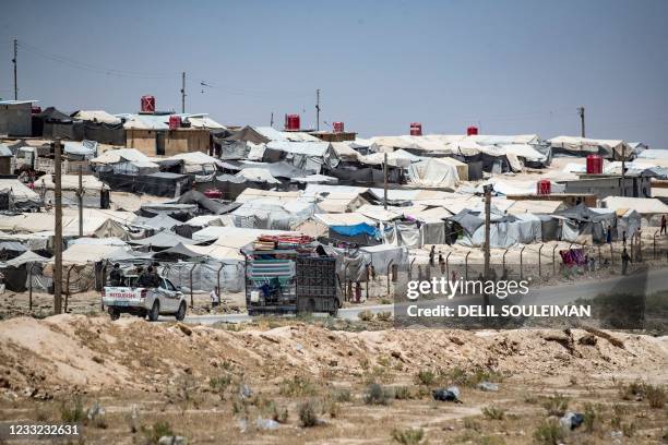 General view shows the Kurdish-run Al-Hol camp, which holds relatives of suspected Islamic State group fighters, in the northeastern Syrian Hasakeh...