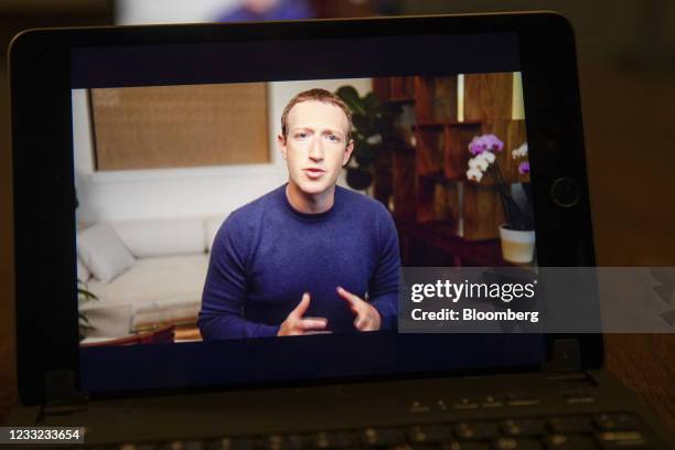 Mark Zuckerberg, chief executive officer of Facebook Inc., speaks during the virtual F8 Developers Conference on a tablet computer in Tiskilwa,...