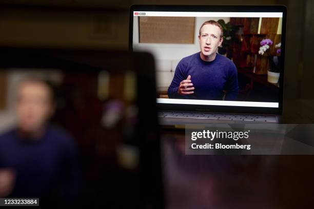 Mark Zuckerberg, chief executive officer of Facebook Inc., speaks during the virtual F8 Developers Conference on a laptop computer in Tiskilwa,...