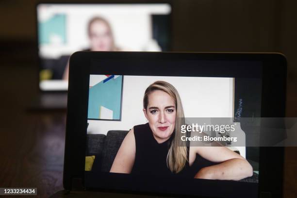 Kelly Stonelake, director of platform product marketing for Facebook, Inc., smiles during the virtual F8 Developers Conference on a laptop computer...