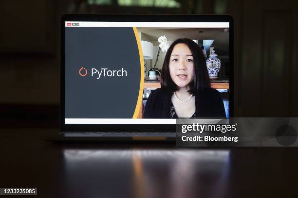 Lin Qiao, director of artificial intelligence engineering for Facebook Inc., speaks during the virtual F8 Developers Conference on a laptop computer...