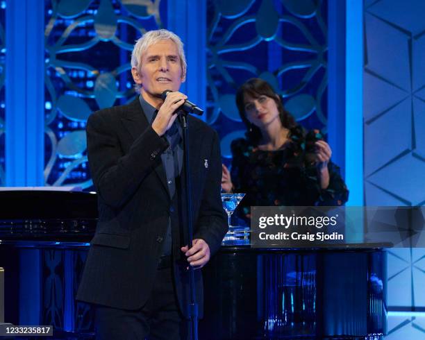 Hannah Brown and Nicole Byer Hosted by actress and singer-songwriter Zooey Deschanel and multiple GRAMMY®-winning singer-songwriter Michael Bolton,...