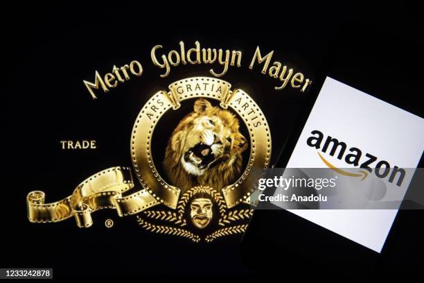 In this illustration photo Amazon logo is displayed on a smart phone screen with Goldwyn Mayer , in Ankara, Turkey on June 3, 2021.