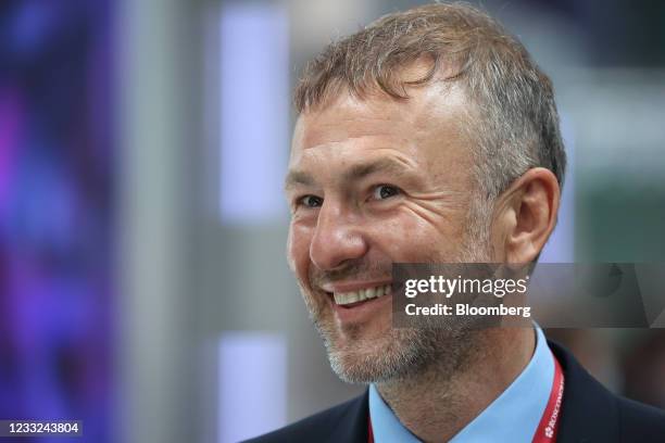 Andrey Melnichenko, billionaire and owner of EuroChem Group AG, reacts between panel sessions on day two of the St. Petersburg International Economic...