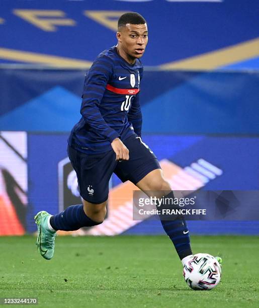France's forward Kylian Mbappe controls the ball during the friendly football match between France and Wales at the Allianz Riviera Stadium in Nice,...