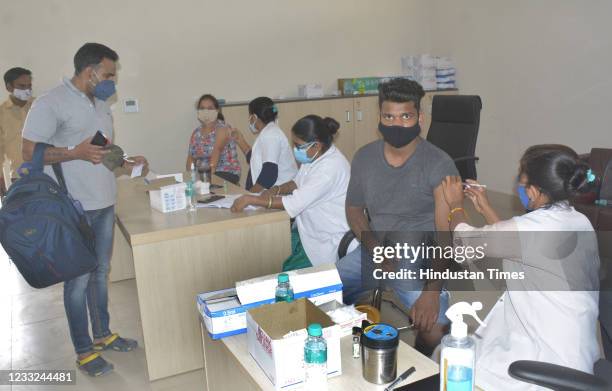 Health worker administers a dose of Covid-19 vaccine during a camp set up by Rashtriya Swayamsevak Sangh at Ghaziabad Indirapuram Kailash Mansarovar...
