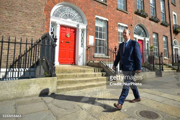 Leader Edwin Poots walks in Dublin city center after attending a press briefing, and before a meeting with Taoiseach Micheal Martin at Government...