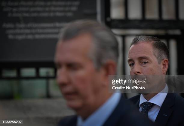 Paul Givan listens to DUP Leader Edwin Poots speaking to the media outside Government Buildings in Dublin after meeting Taoiseach Micheal Martin . On...