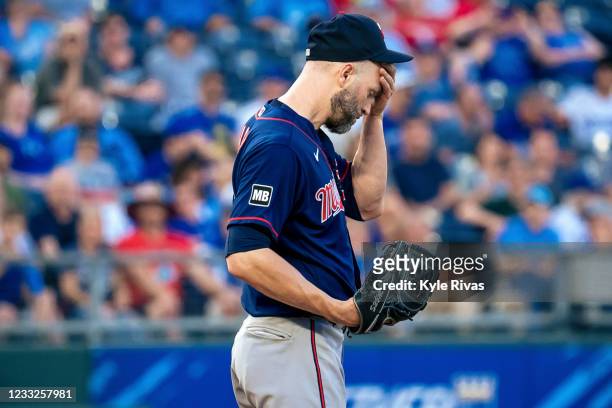 Happ of the Minnesota Twins reacts to loading the bases against the Kansas City Royals in the third inning at Kauffman Stadium on June 3, 2021 in...