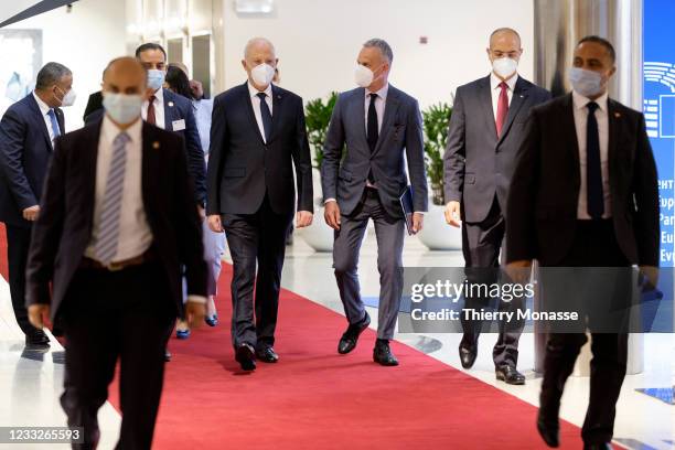 Tunisian President Kais Saied is walking away after a bilateral meeting in the European Parliament on June 4, 2021 in Brussels, Belgium.