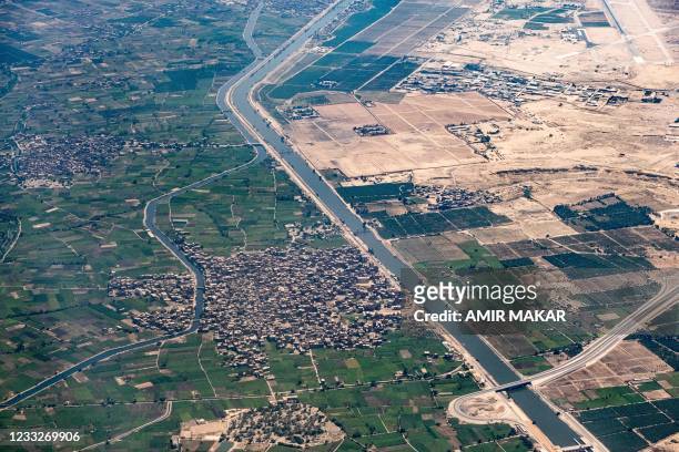 This picture taken on May 28, 2021 shows an aerial view of the village of al-Munayyar in Sharqiyah province of Egypt's Nile Delta agricultural...