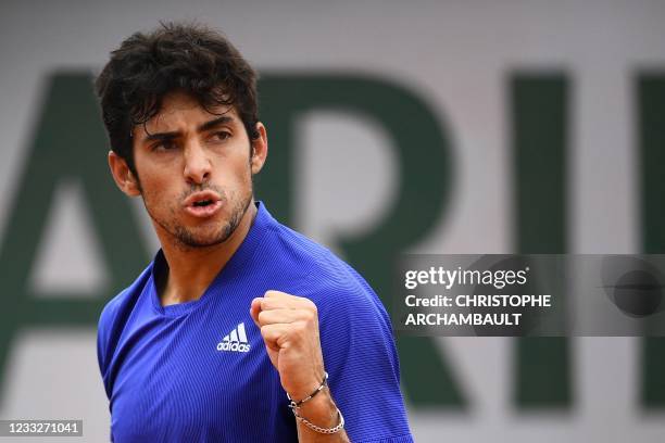 Chile's Christian Garin celebrates after winning a point against Marcos Giron of the US during their men's singles third round tennis match on Day 6...