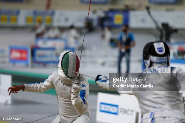 Andrea Baldini and Andrea Cassarà, during the Italian team fencing championships, for the foil category, at the Pala Vesuvio in Naples.