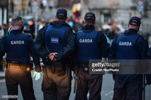 Members of Gardai enforce coronavirus restrictions and relocate people from South William Street in Dublin. On Friday, 4 June 2021, in Dublin,...