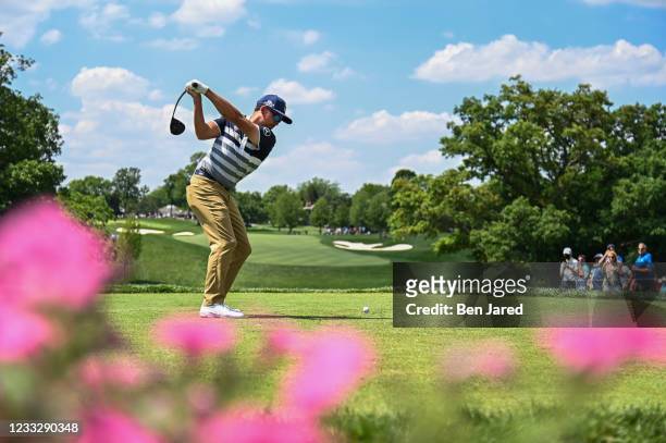 Rickie Fowler swings over his ball on the 10th tee box during the third round of the Memorial Tournament presented by Nationwide at Muirfield Village...