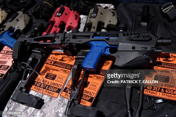 Pistol brace for a handgun is displayed with firearm accessories for sale at the Crossroads of the West Gun Show at the Orange County Fairgrounds on...