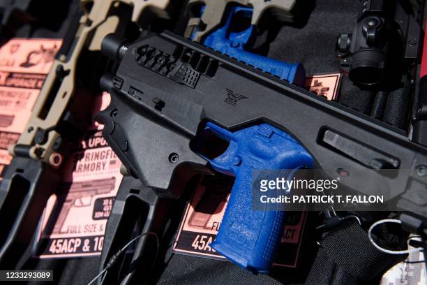 Pistol brace for a handgun is displayed with firearm accessories for sale at the Crossroads of the West Gun Show at the Orange County Fairgrounds on...